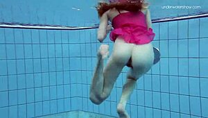anna netrebko glides underwater in bikini teasing her wet petite curves