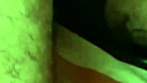 guy unloads cum on her face while she's kneeling close-up view