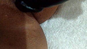 Wife grabs her favorite dildo for some playful homemade fun on camera