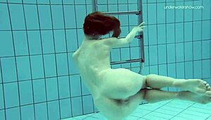 anna netrebko glides underwater in bikini teasing her wet petite curves