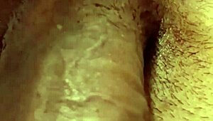 guy unloads cum on her face while she's kneeling close-up view