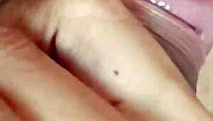 guy unloads cum on her face while she's kneeling close-up view