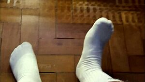 brazilian hunk flexes massive feet alongside his throbbing monster cock