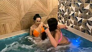 Pool orgy hints at steamy water fun and teasing licks