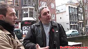 dutch hooker takes it doggystyle from tourist till he blasts cum all over her