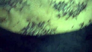 Shiny spandex clings to mature woman's huge jiggling ass cheeks during tease