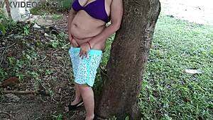 horny stepmom fingers her ass alone and rubs pussy on tree in forest 🌳🍑💦