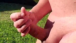 Sunlit garden handjob blasts cum everywhere!